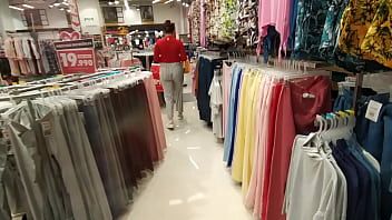 Play I chase an unknown woman in the clothing store and show her my cock in the fitting rooms